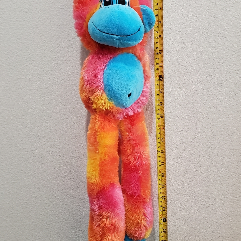 hanging monkey with velcro closure. Hang from your neck, backpack, door etc..